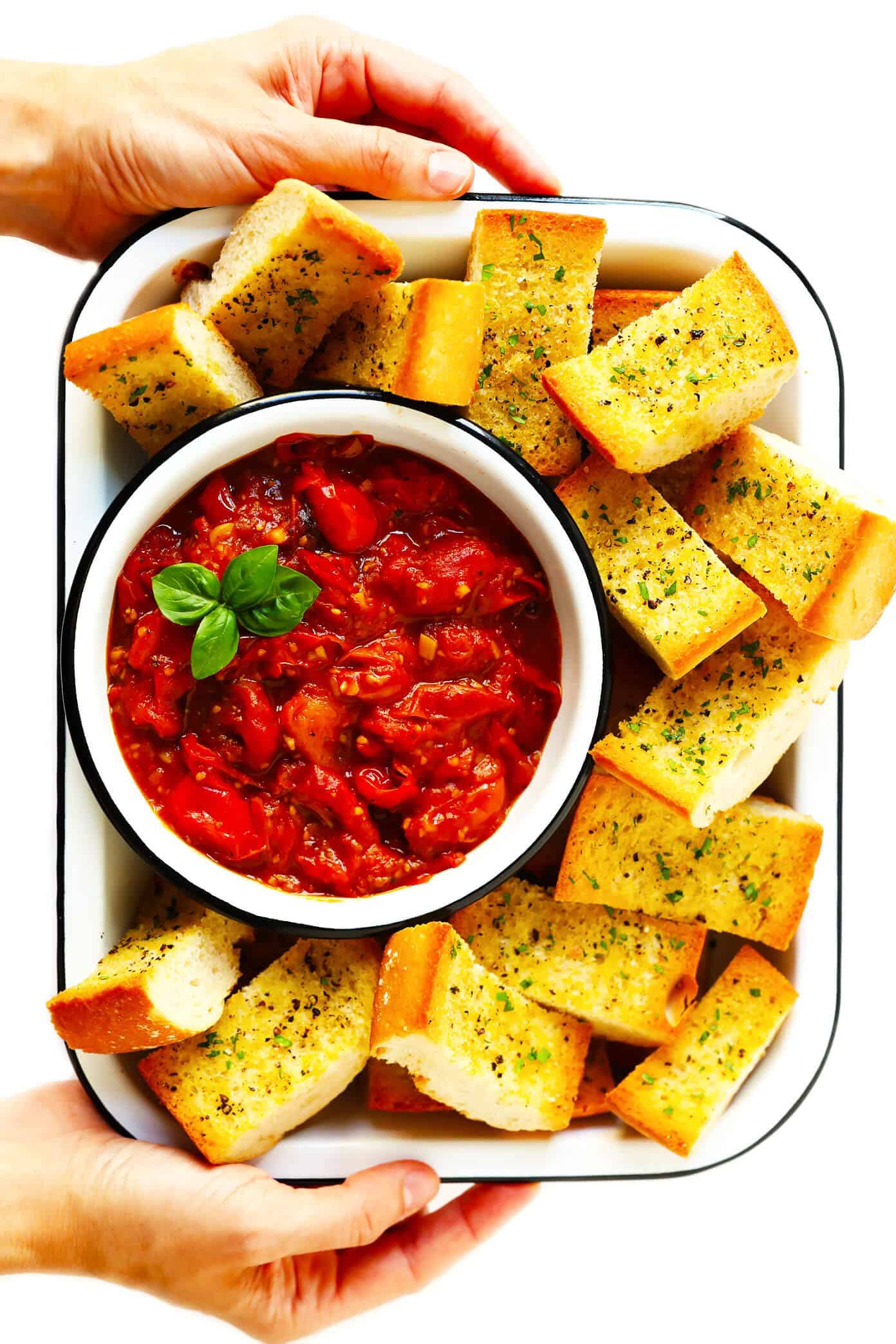 This garlicky Burst Tomato Spread is easy to make with just 5 ingredients and tastes AMAZING served warm with crusty bread. It's the perfect easy appetizer for summertime! | gimmesomeoven.com #tomato #spread #dip #glutenfree #vegan #healthy #appetizer #summer #entertaining Burst Tomato Spread with Crusty Bread