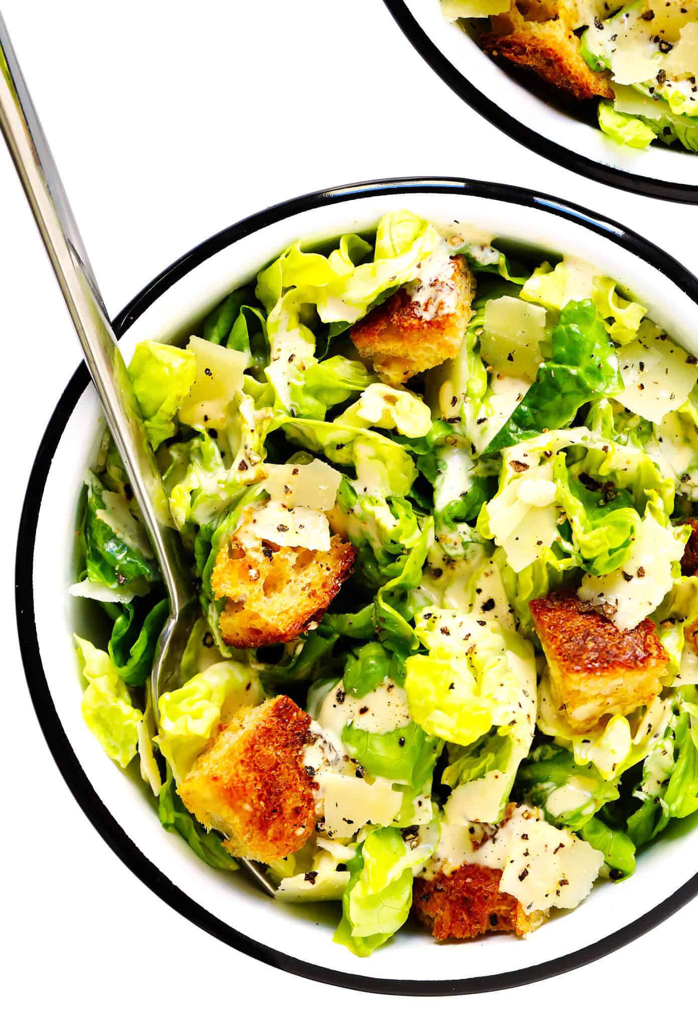The BEST homemade Caesar salad recipe -- full of crisp lettuce, toasty sourdough croutons, lots of Parmesan cheese, and my all-time favorite homemade Caesar dressing. Feel free to add in some proteins (chicken, shrimp, salmon, etc.) or grill the lettuce too, if you would like! | gimmesomeoven.com #caesar #salad #dressing #homemade #glutenfree #healthy #summer #italian Homemade Caesar Salad