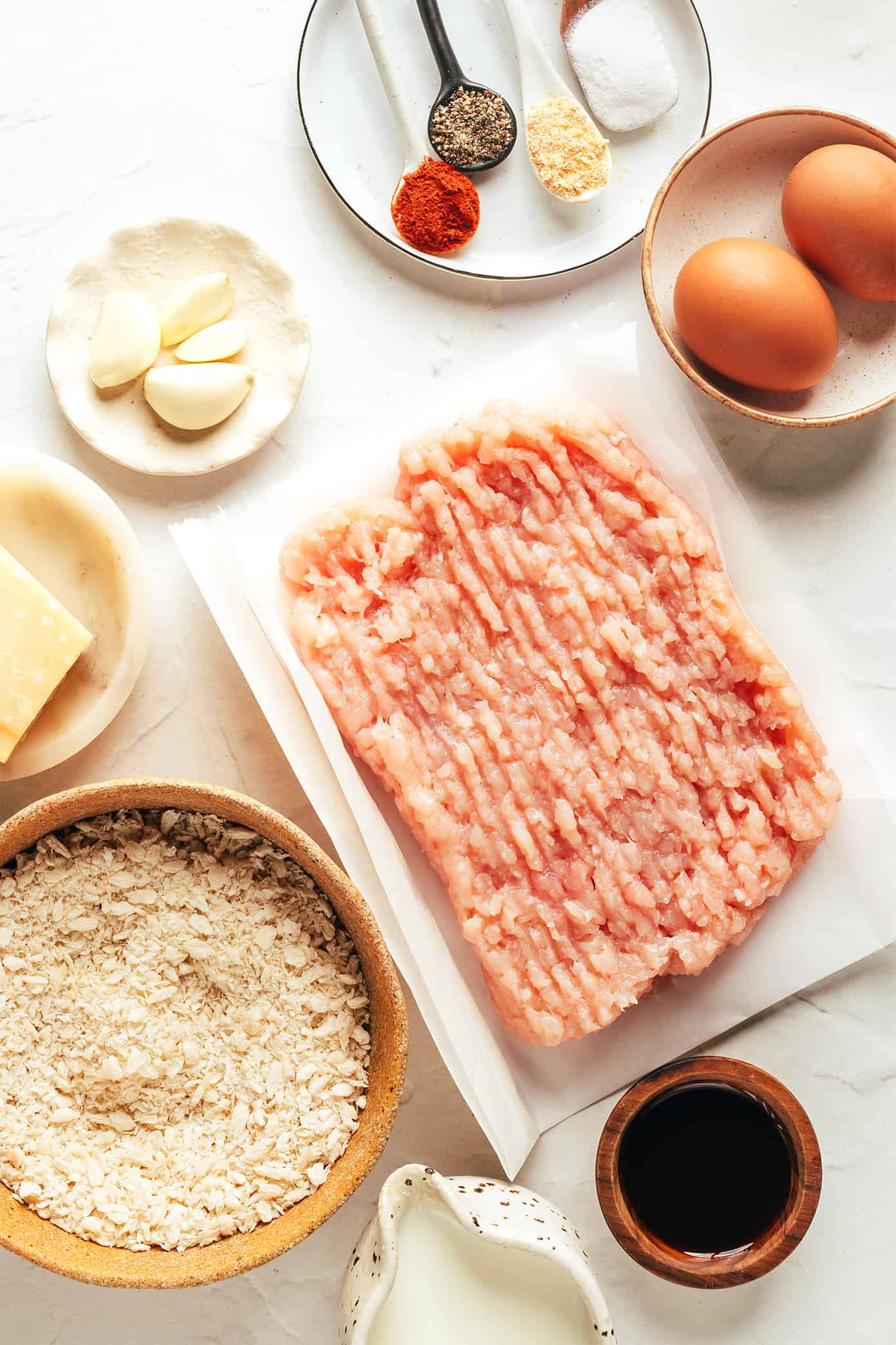 My go-to baked chicken meatballs recipe is easy to make, perfectly moist and tender, and customizable with your favorite seasonings. Serve with Italian marinara, Swedish gravy, Thai curry, Greek tzatziki, buffalo sauce, or whatever sounds best! | gimmesomeoven.com Chicken meatball ingredients