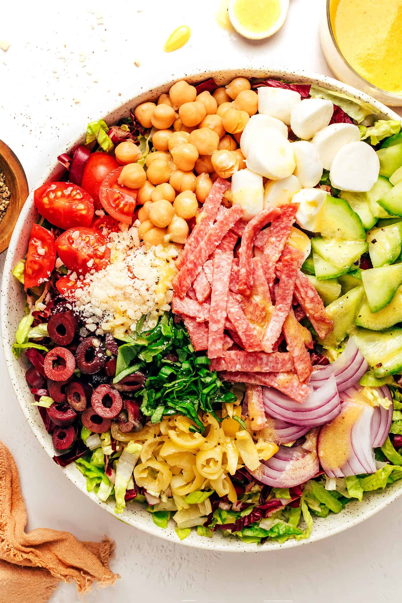 My favorite Italian chopped salad recipe is fresh, hearty, and bursting with zesty Italian flavors in each bite. | gimmesomeoven.com Assembling an Italian chopped salad