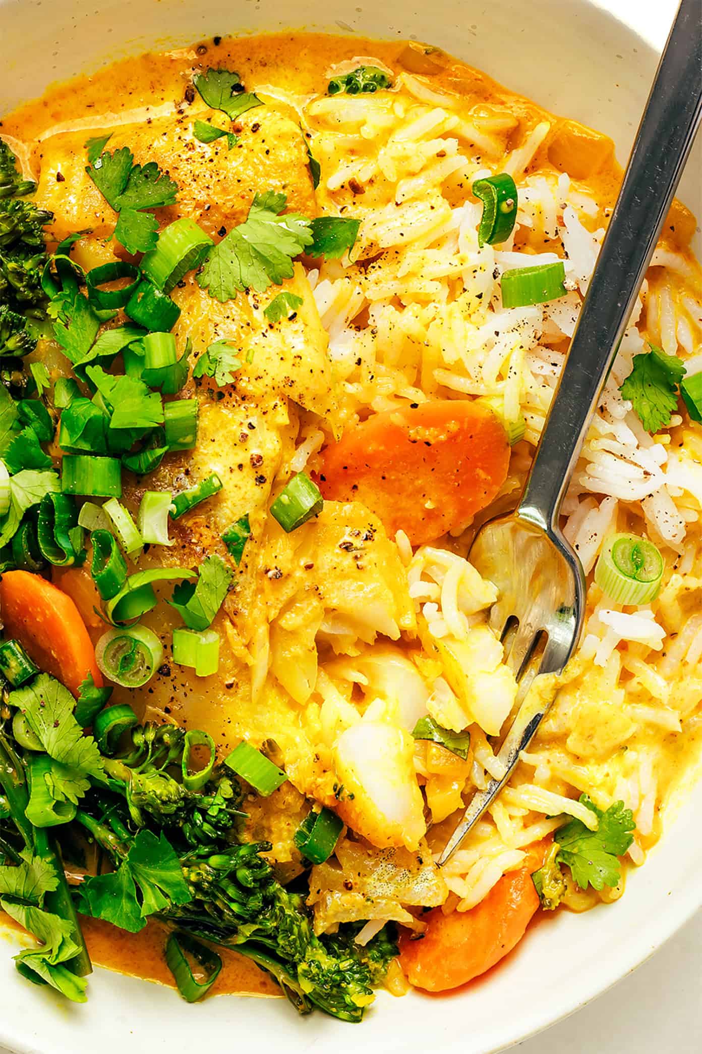 This lovely Thai-inspired curry recipe features tender white fish simmered in a creamy coconut curry broth with veggies. Thai Fish Curry Closeup