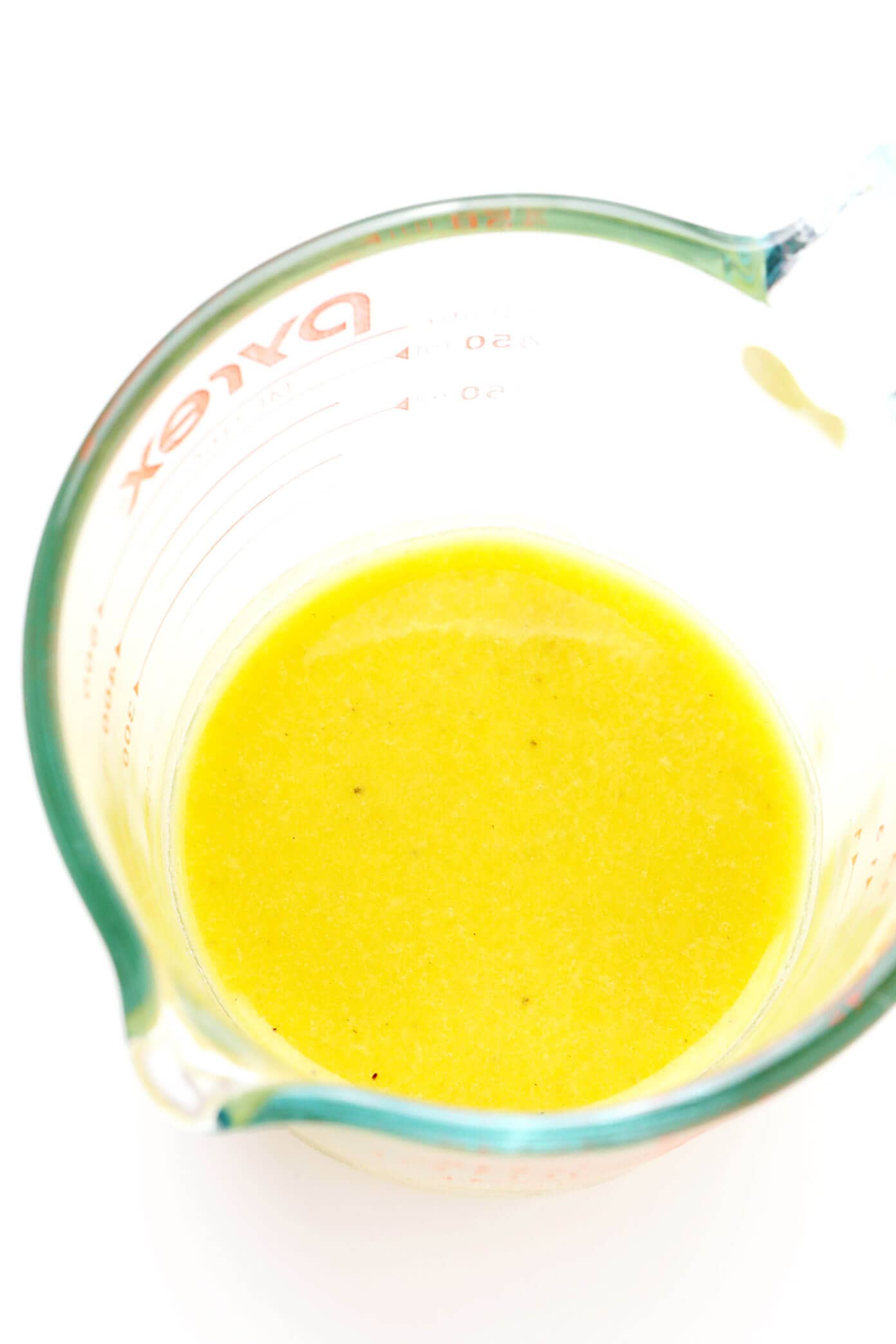 This basic salad dressing recipe is quick and easy to make, full of zippy fresh flavors, and versatile enough to go with just about any type of salad! You can opt to either make it with lemon juice or your choice of vinegar (to make it a vinaigrette), and feel free to add in extra herbs or sweetener too. | gimmesomeoven.com #salad #dressing #lemon #vinaigrette #glutenfree #vegan #healthy #vegetarian #mealprep How To Make Salad Dressing In A Measuring Cup