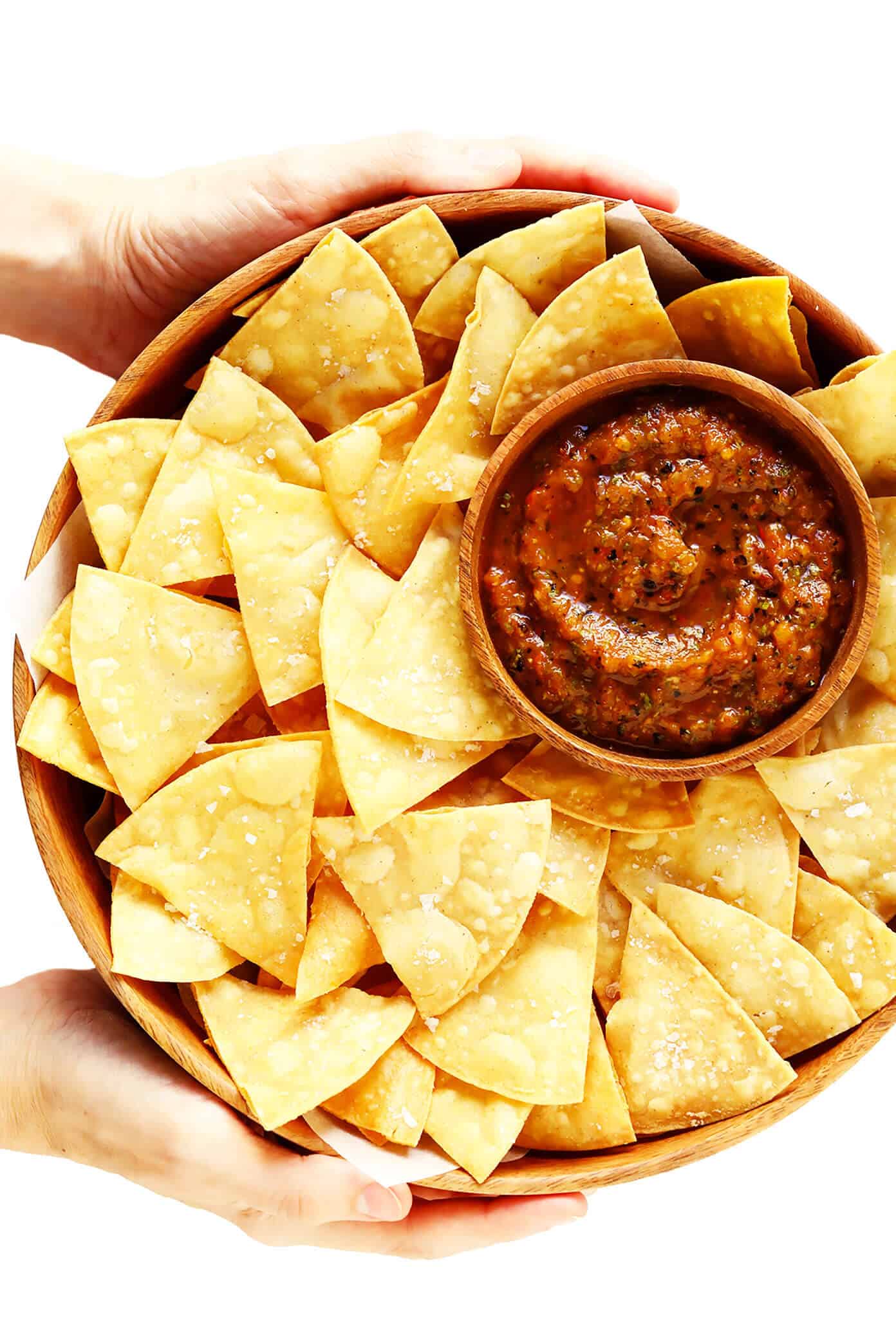 This homemade tortilla chips recipe is easy to make with 3 basic ingredients (corn tortillas, oil and salt) and always SO delicious! | gimmesomeoven.com #homemade #corn #tortilla #chips #glutenfree #vegan #vegetarian #appetizer #gameday #snack Homemade Tortilla Chips with Roasted Tomato Salsa