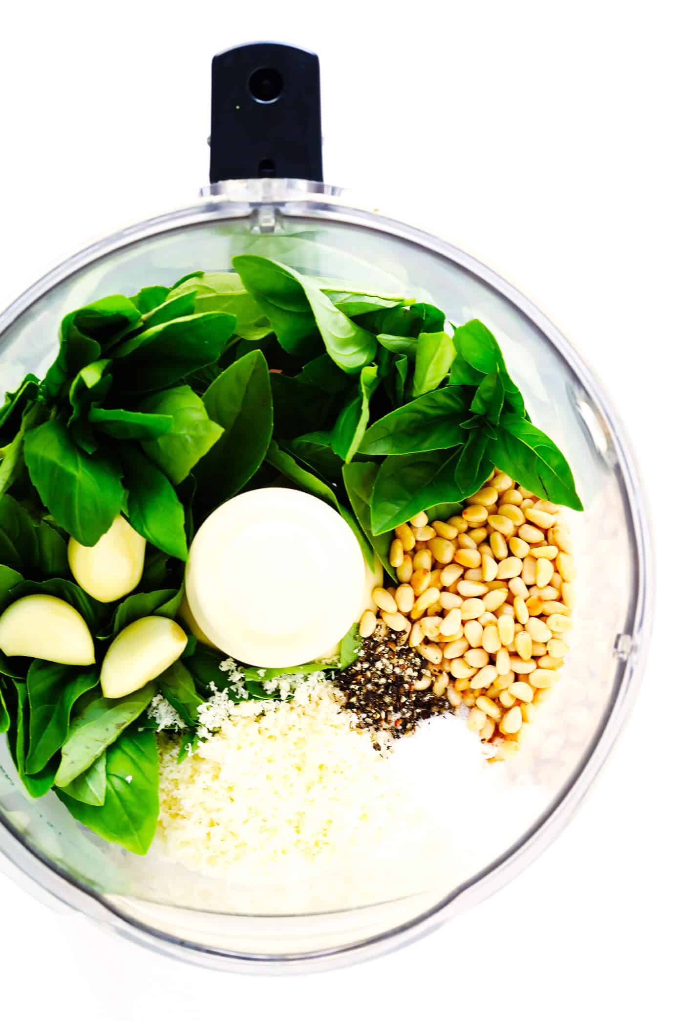 Learn how to make pesto with this classic Italian fresh basil pesto recipe. It's easy to make in the blender or food processor, and perfect for using as a pesto sauce for pasta, pizza, chicken, potatoes...you name it! | gimmesomeoven.com #pesto #sauce #italian #recipe #dinner #mealprep #summer #vegetarian #healthy How To Make Pesto Ingredients