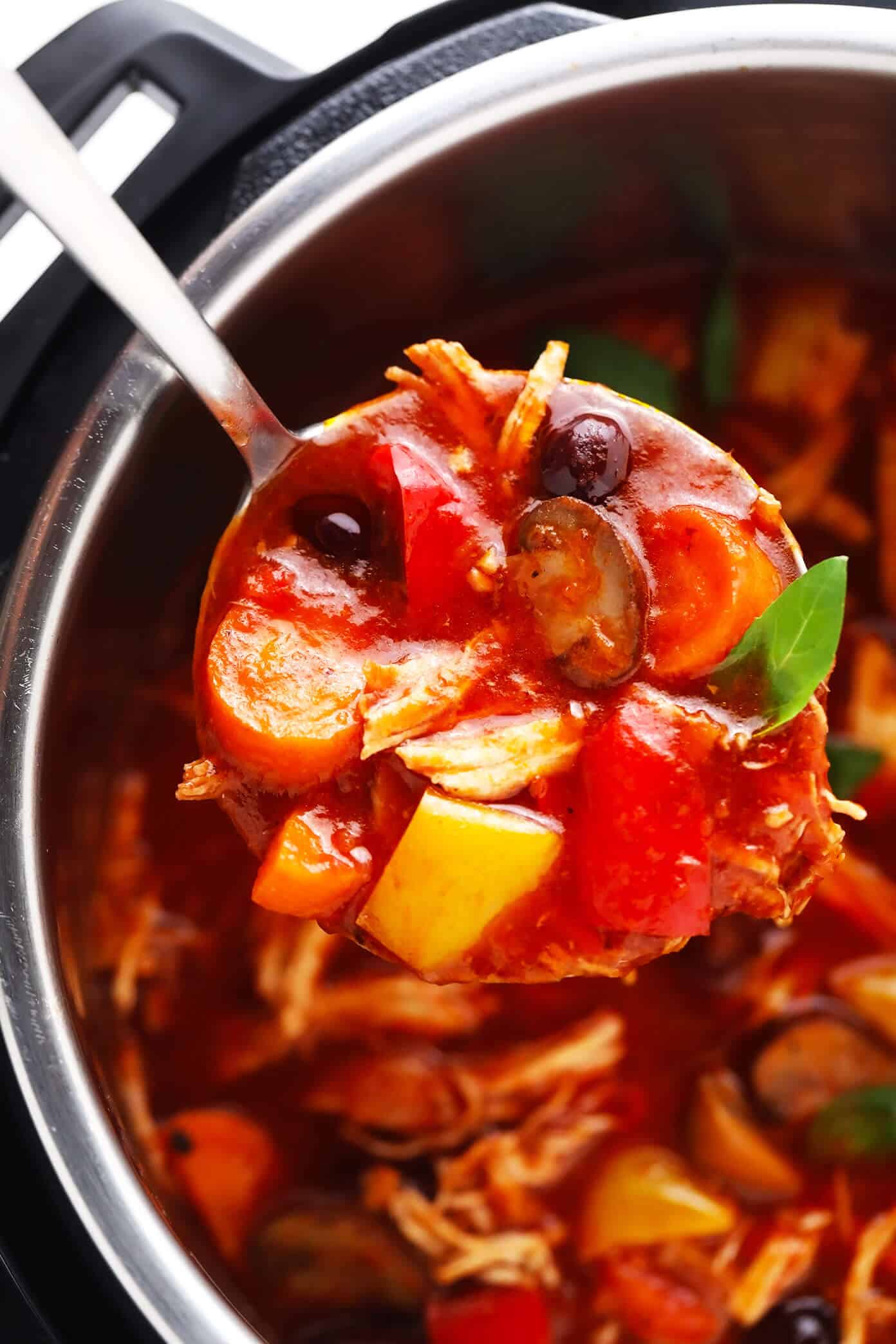 This chicken cacciatore recipe is easy to make with your choice of veggies and simmered in a flavorful garlic-herb tomato sauce. Easy to make in either the Instant Pot, Crock-Pot or on the stovetop and delicious served over pasta or polenta. Always a great dinner recipe for Italian night! | gimmesomeoven.com Instant Pot Chicken Cacciatore