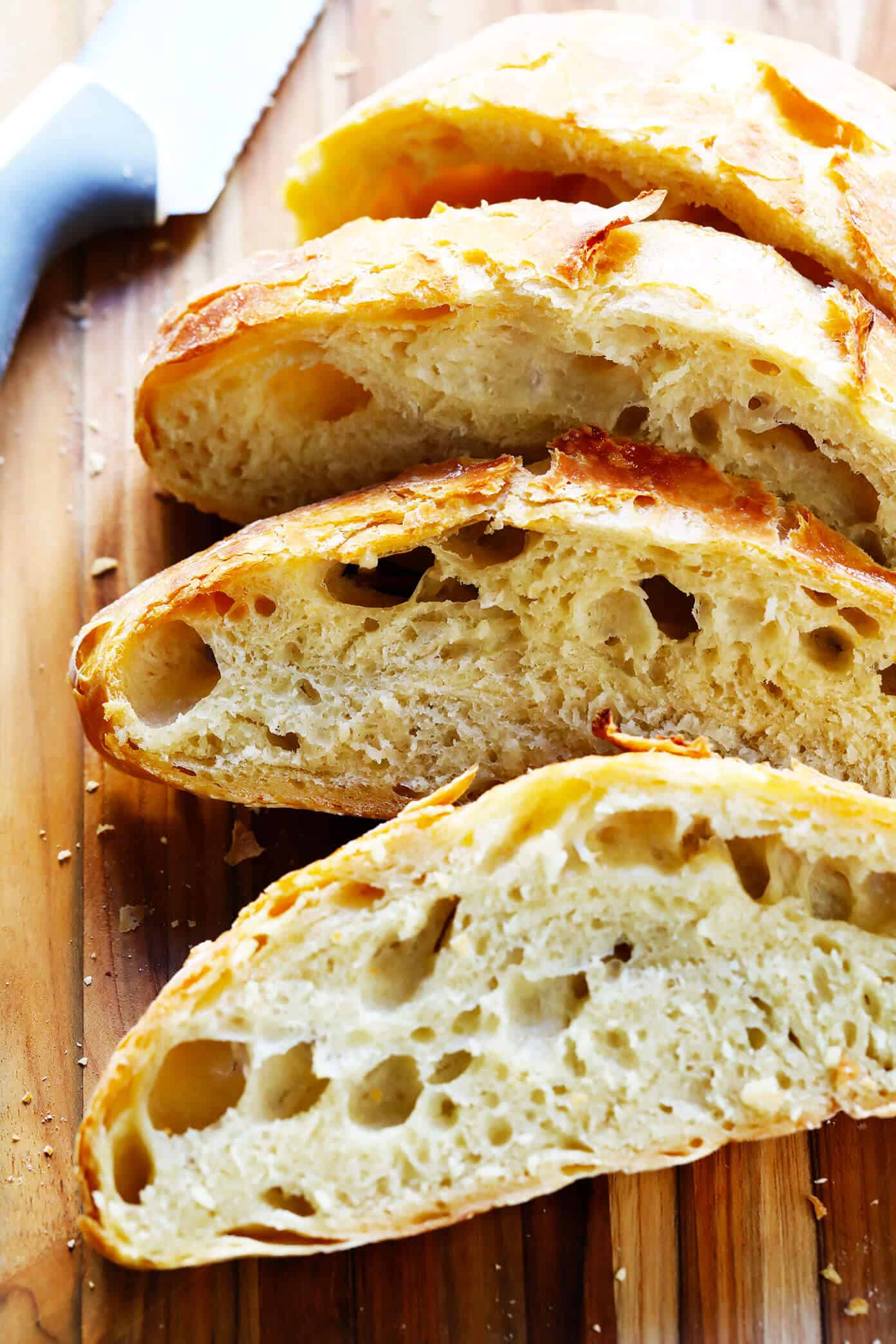 The BEST No Knead Bread recipes -- the traditional (overnight) method or a faster (2-hour) method. Both yield the most delicious crusty homemade bread loaves that are easy to make with minimal hands-on prep time. | gimmesomeoven.com #bread #noknead #easy #side #vegan #vegetarian #homemade No Knead Bread Recipe