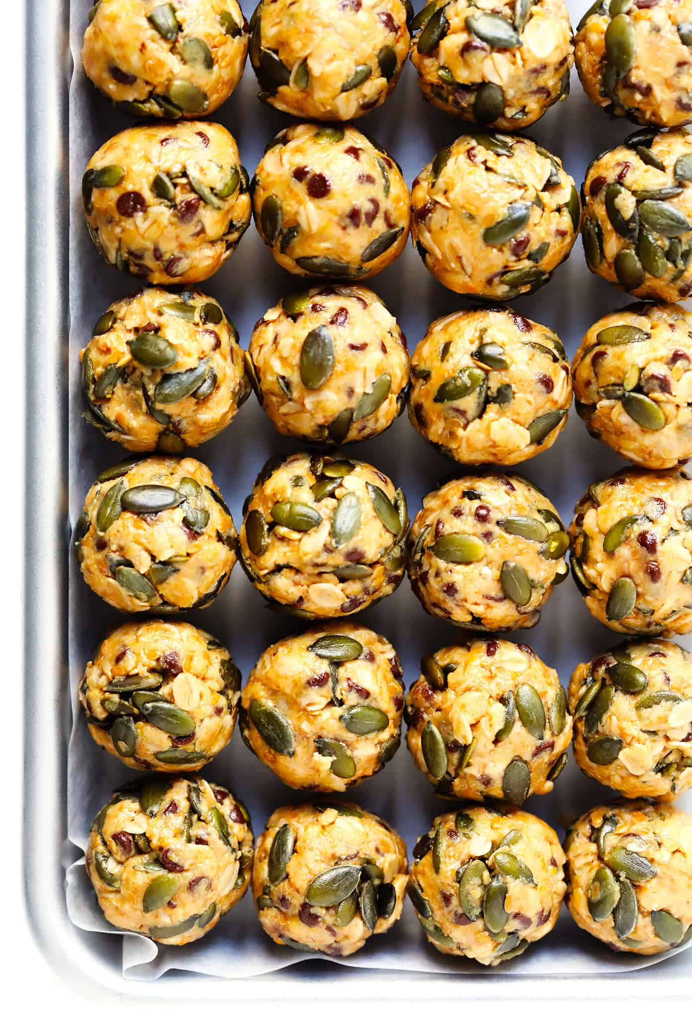 This simple Seed Cycling Energy Bites recipe is a delicious way to eat the daily serving of seeds recommended to help naturally balance women's hormones. Naturally gluten-free, easy to make, and delicious too! | gimmesomeoven.com #healthy #snack #hormones #health #glutenfree #vegan #breakfast #seedcycling Follicular Seed Cycling Energy Bites