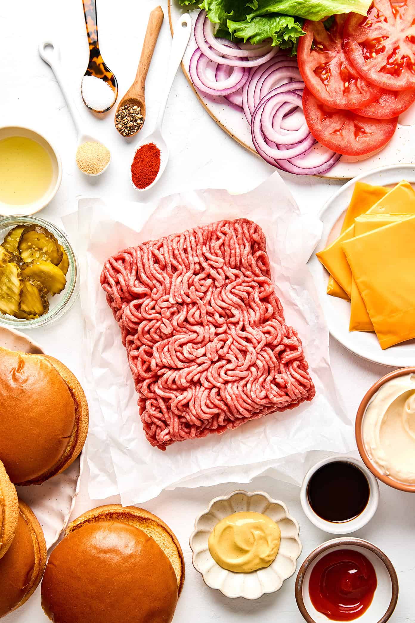 Learn how to make the most juicy, crispy-edged, flavorful homemade smash burgers with this quick and easy recipe. Perfect for easy dinners, grill outs, game day, or anytime you're craving an excellent burger. | gimmesomeoven.com Smash burger ingredients