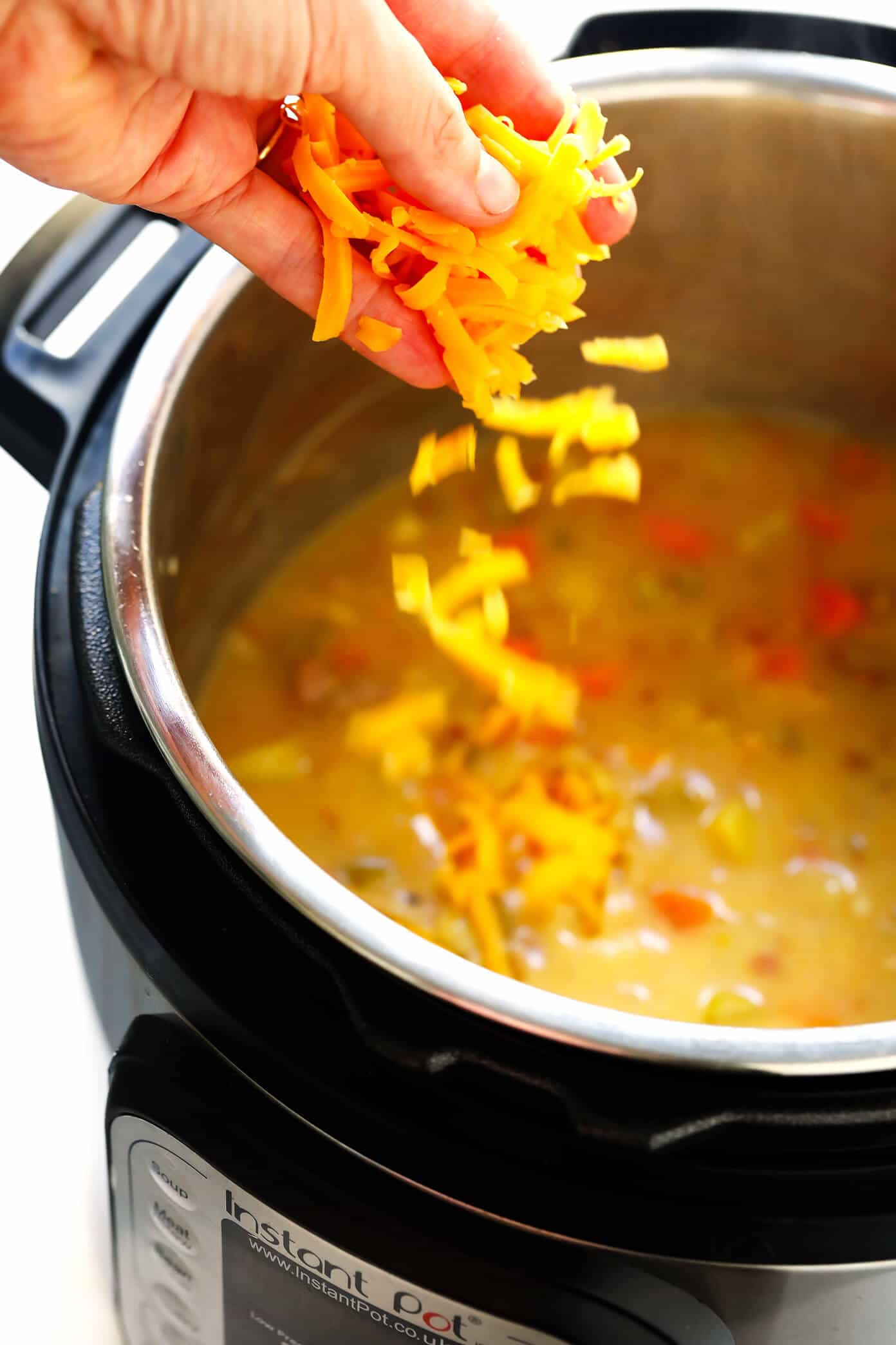 This delicious Turkey Cheeseburger Soup recipe is lightened up with a few simple tweaks, it's full of veggies, and easy to make in the pressure cooker, slow cooker or on the stovetop. | Gimme Some Oven #soup #turkey #cheeseburger #instantpot #crockpot #dinner #healthy How To Make Turkey Cheeseburger Soup in the Instant Pot (Pressure Cooker)