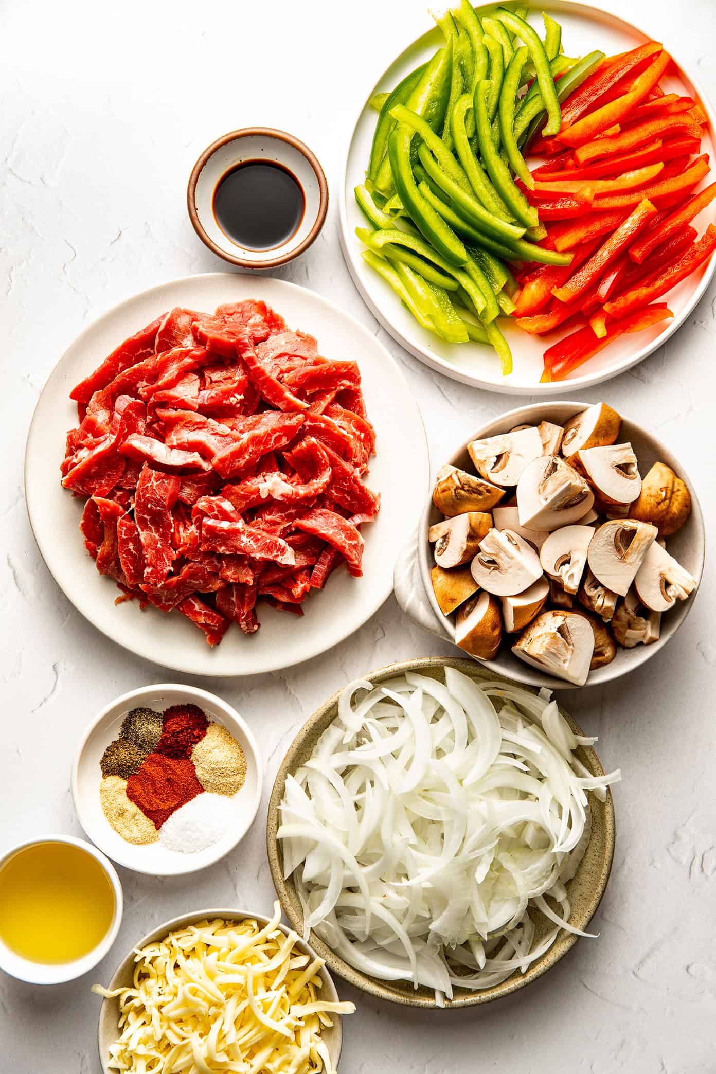 This zesty Philly cheesesteak skillet is a quick and easy one-pan recipe made with tender steak, sautéed veggies, melty provolone, and bold seasonings. Zesty Philly Cheesesteak Skillet Ingredients